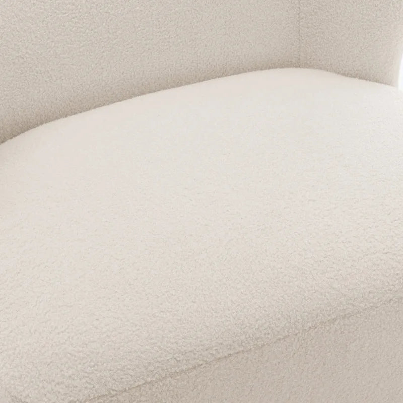 Fauteuil d'appoint en bouclé avec assise à ressorts ensachés